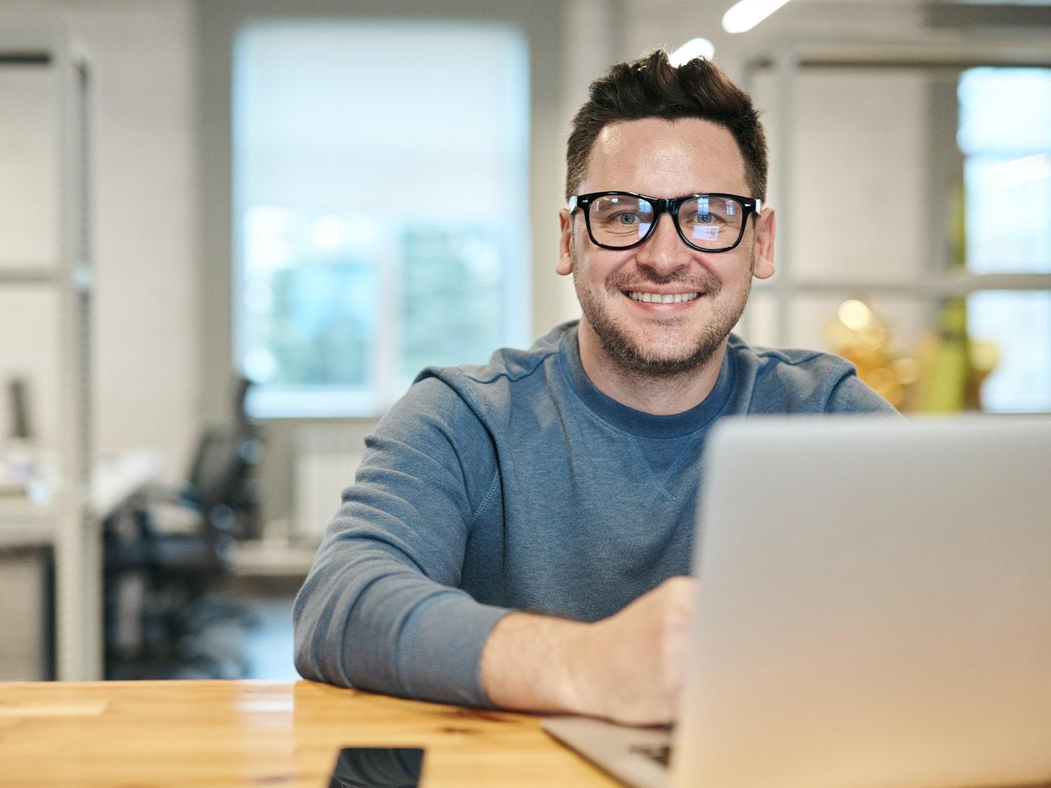 Happy lawyer working on digital marketing