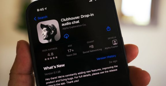 Person looking at Clubhouse app