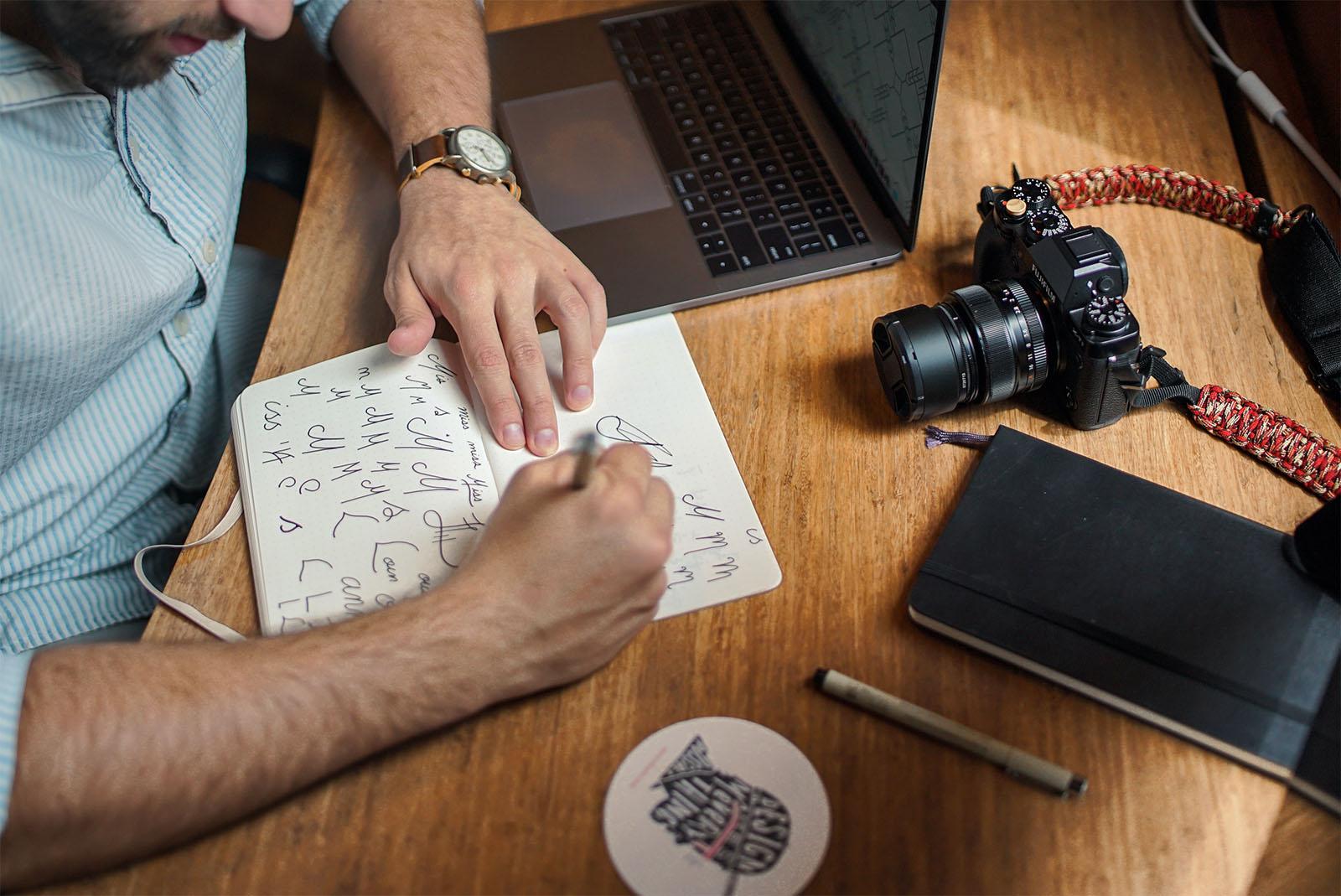 Lawyer writing at his desk