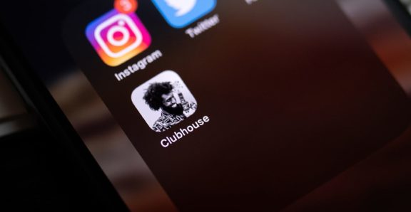 Lawyer's smartphone focused on the clubhouse app